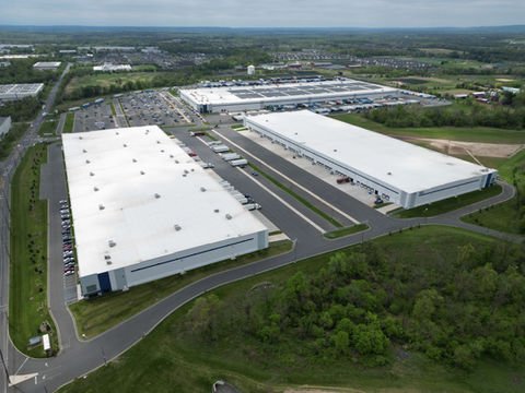 Aerial view of large white industrial warehouses, part of a commercial portfolio. | Down To Earth Landscaping | Jackson New Jersey, USA (732) 833-7702