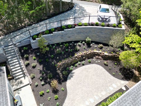 Modern multi-level residential property with retaining walls. Residential Portfolio. Residential landscaping near me| Down To Earth Landscaping | Jackson New Jersey, USA (732) 833-7702