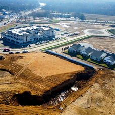 Aerial view of new residential and commercial construction development. Commercial Landscaping near me | Down To Earth Landscaping | Jackson New Jersey, USA (732) 833-7702